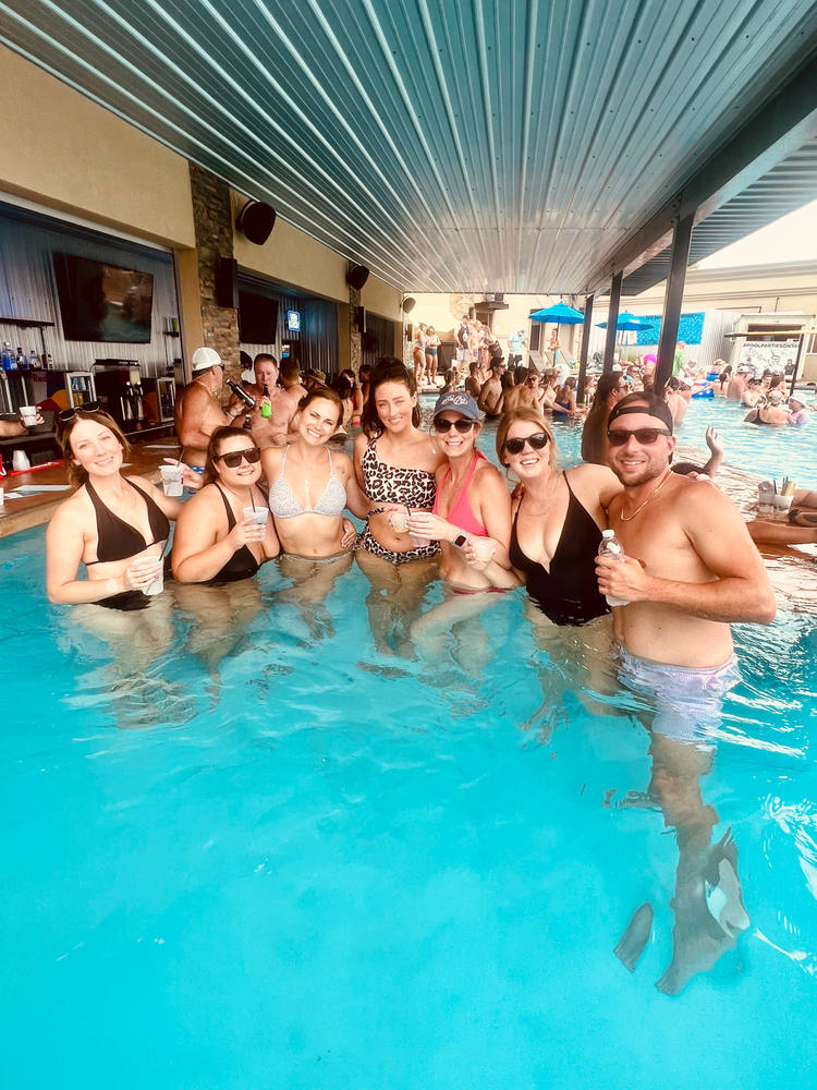 Charter group in the swim-up pool bar at a Lake of the Ozarks lakeside venue